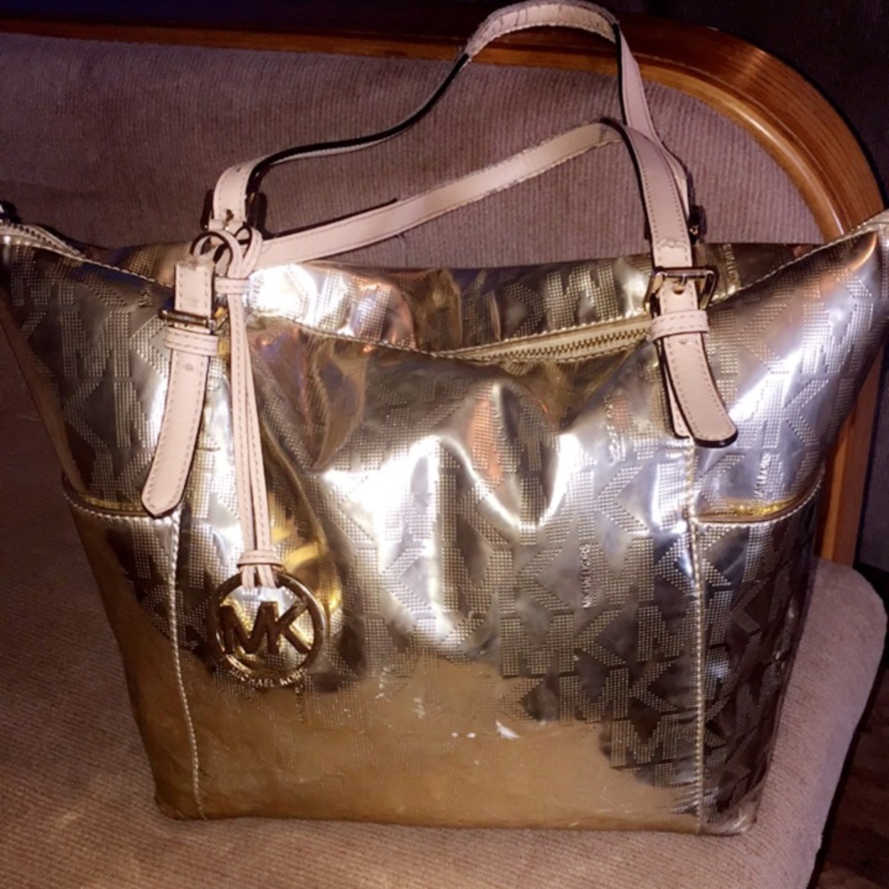 Gold Micheal Kors purse